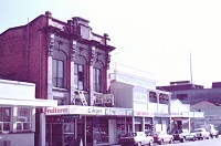 Brick building and Queen Street Shops