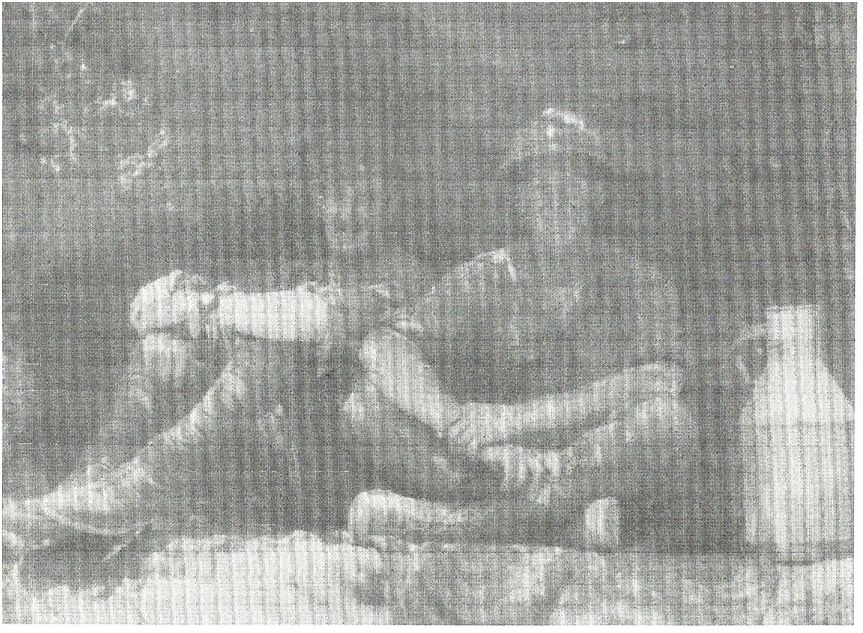 Rawson Matthew Holmes Frank Davison pose in a dugout Gallipoli