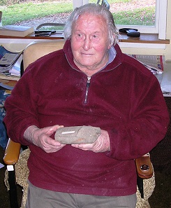 George McMurtry with stone adze 1250 AD found Templemore Pond resize