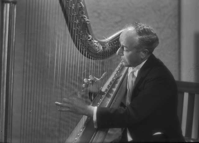 Vitetta brother playing the harp