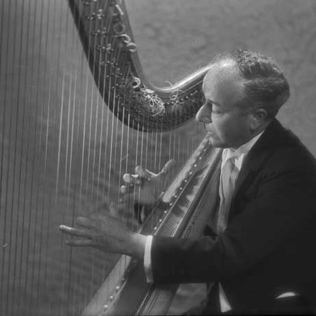 Vitetta brother playing the harp